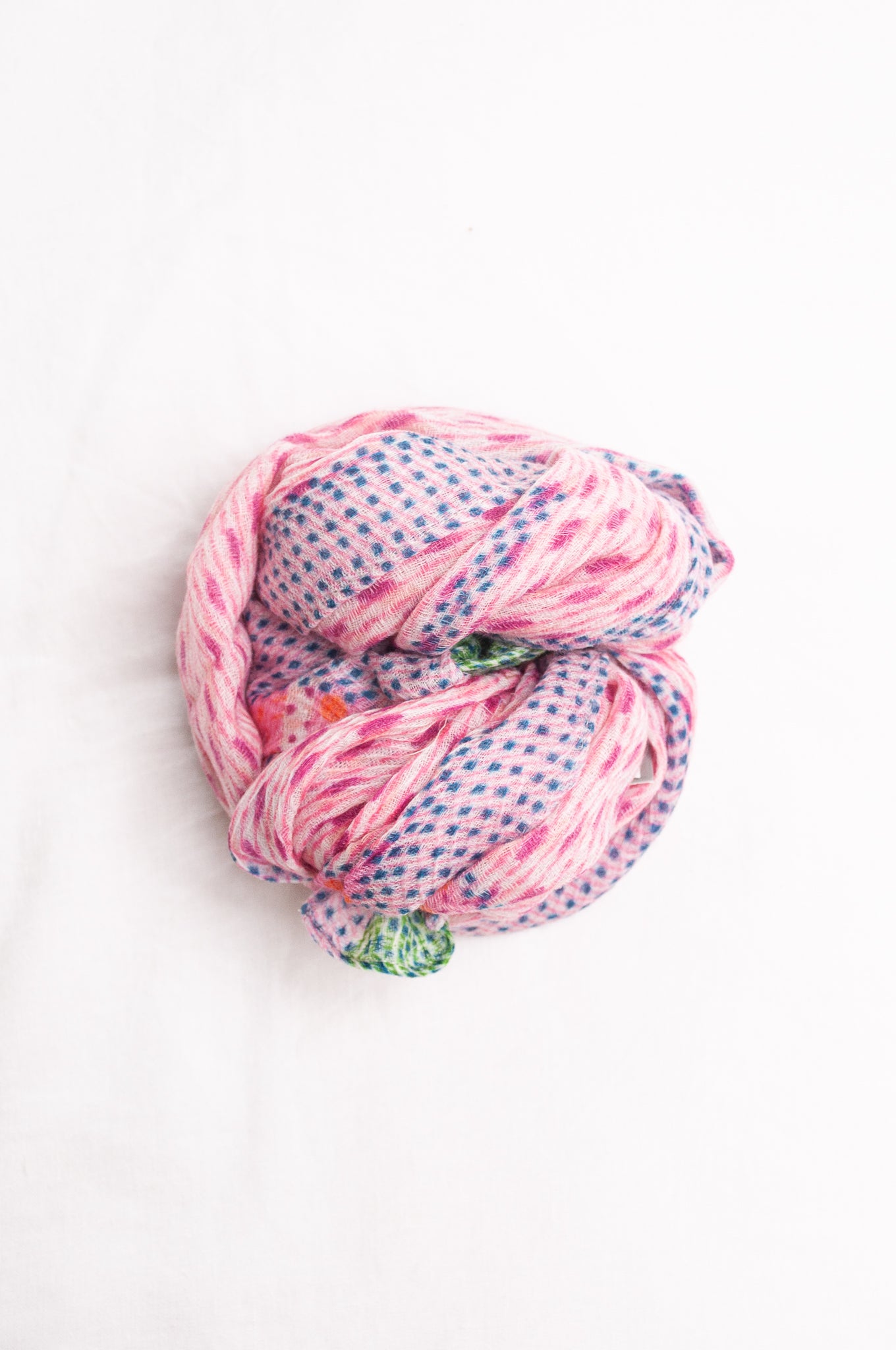 Anna Kaszer fine wool patterned scarf in pink with blue and green highlights.
