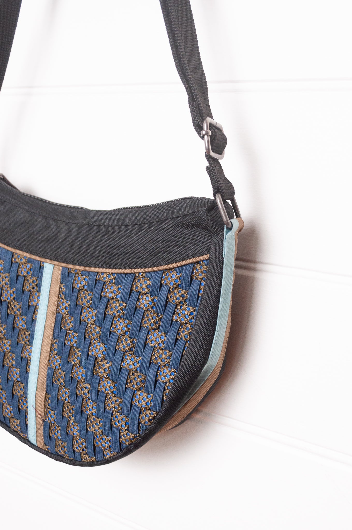 Anna Kaszer Fantio cross body bag with woven braid panel in night dark blue.