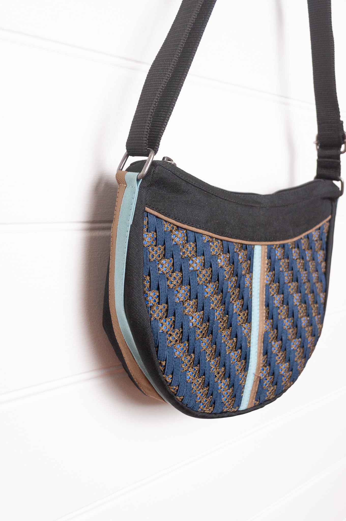 Anna Kaszer Fantio cross body bag with woven braid panel in night dark blue.