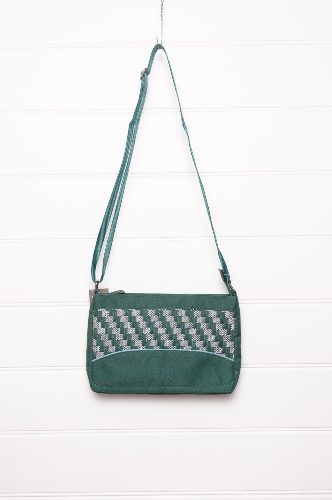 Anna Kaszer forest green Taki cross body bag with woven braid panel.