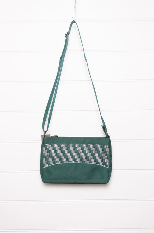 Anna Kaszer forest green Taki cross body bag with woven braid panel.
