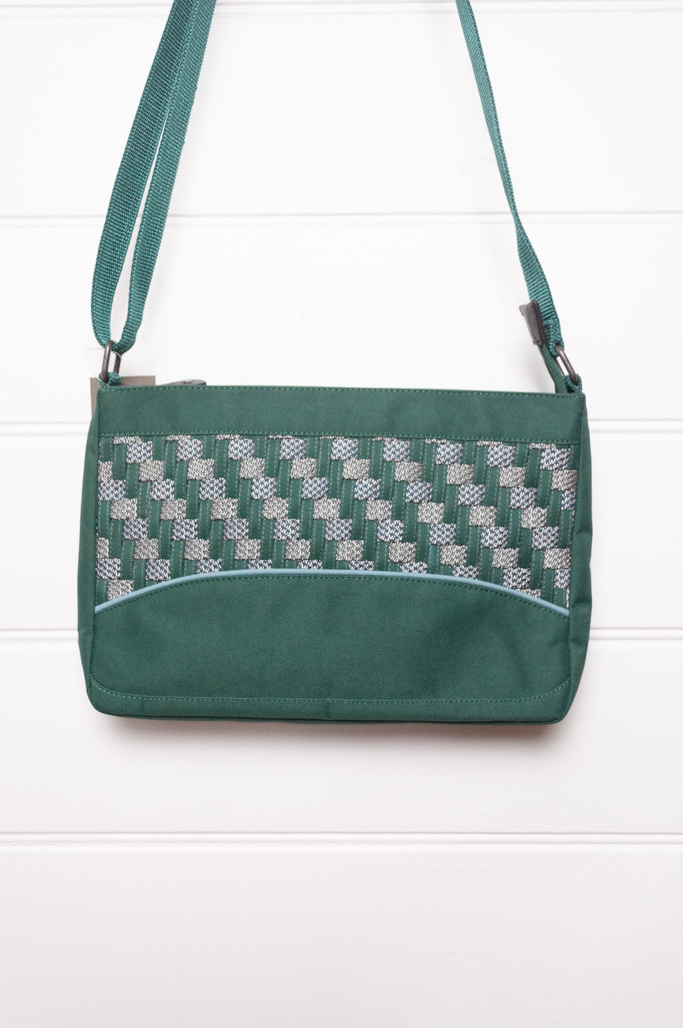 Anna Kaszer forest green Taki cross body bag with woven braid panel.