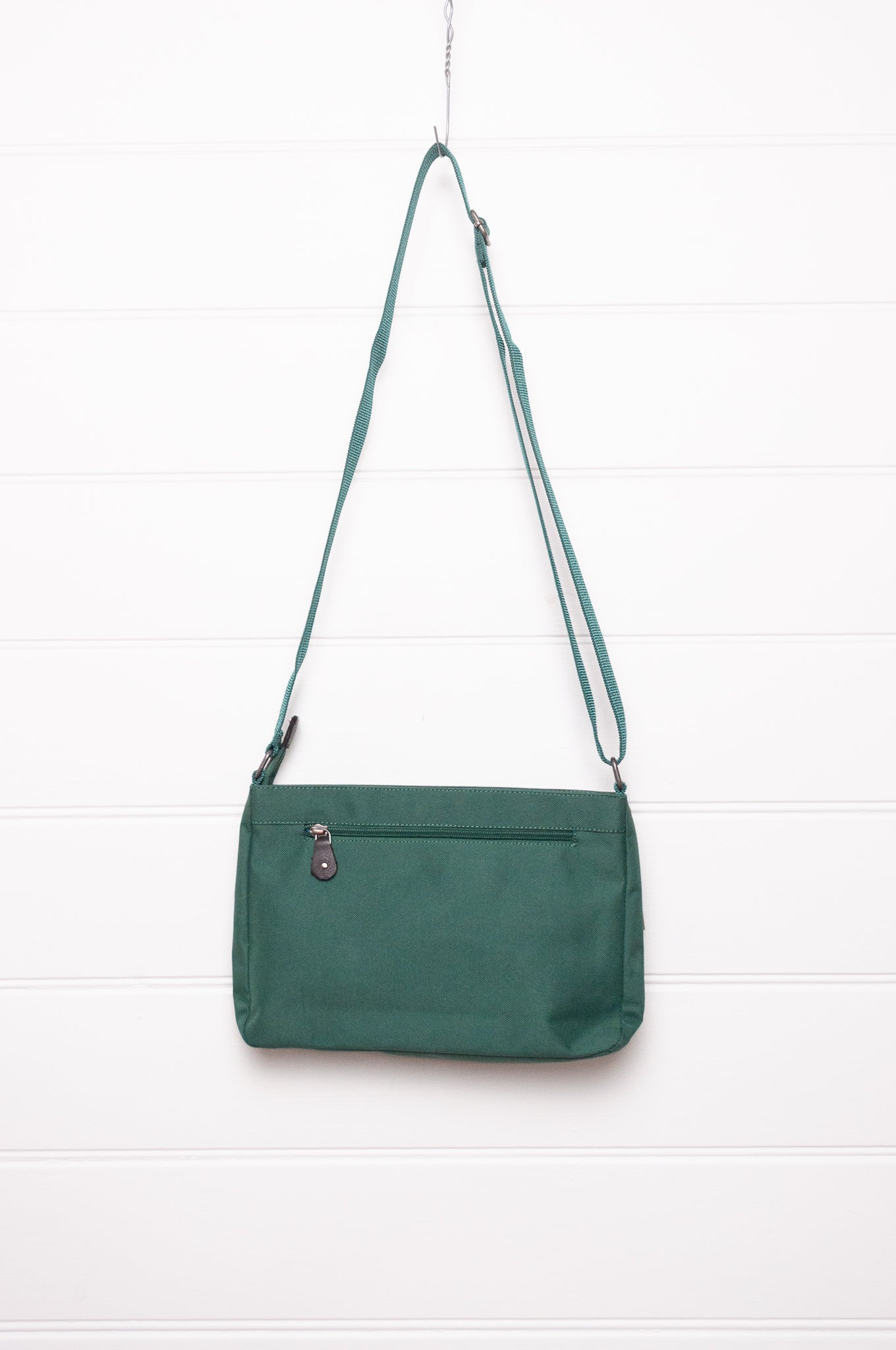 Anna Kaszer forest green Taki cross body bag with woven braid panel.