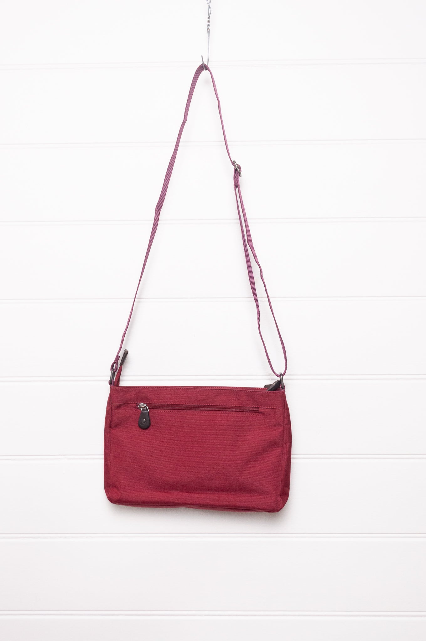 Anna Kaszer Loli red Taki cross body bag with woven braid panel.