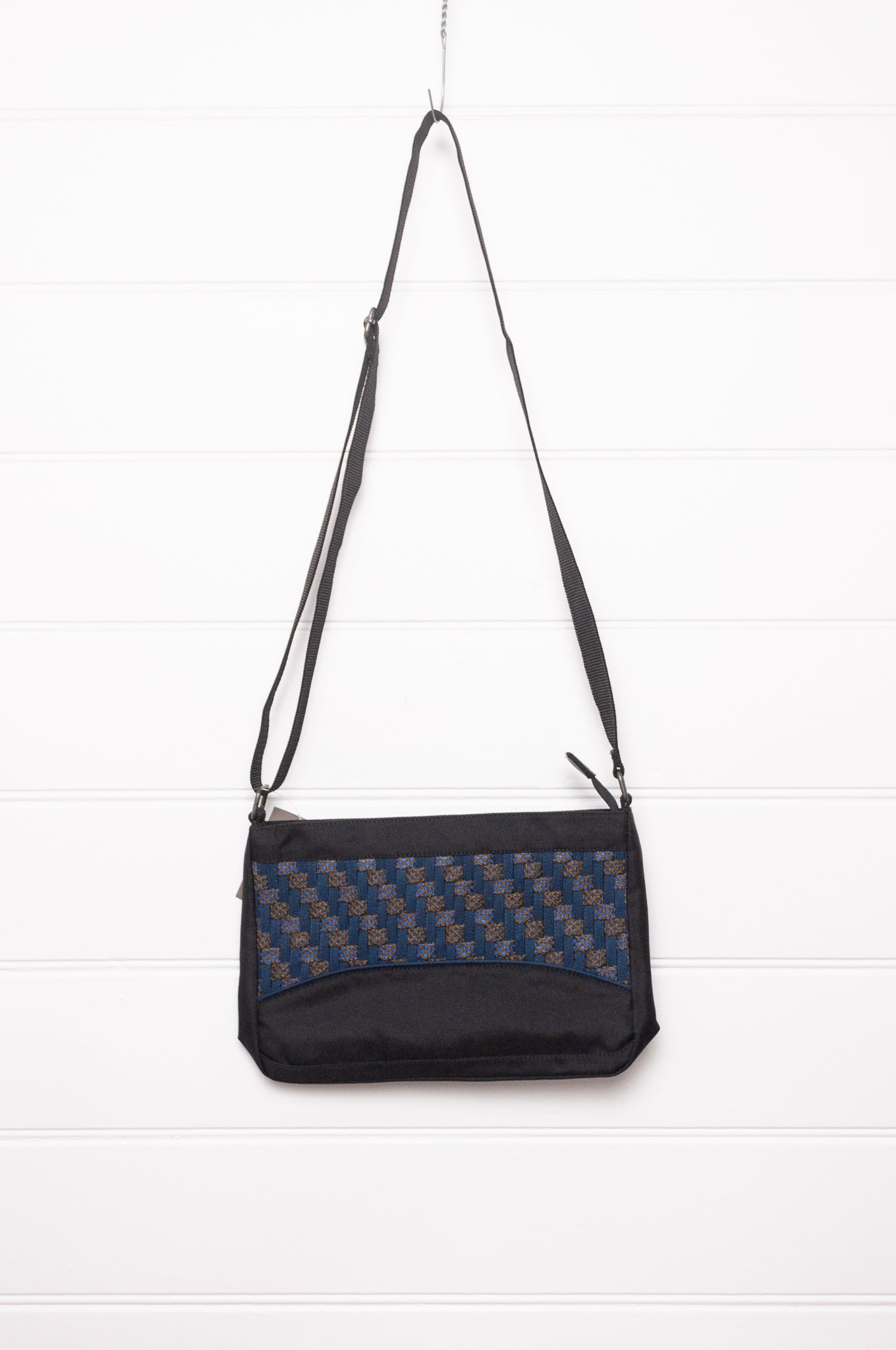 Anna Kaszer Taki small cross body bag in deep navy Night blue, with woven braid panel.