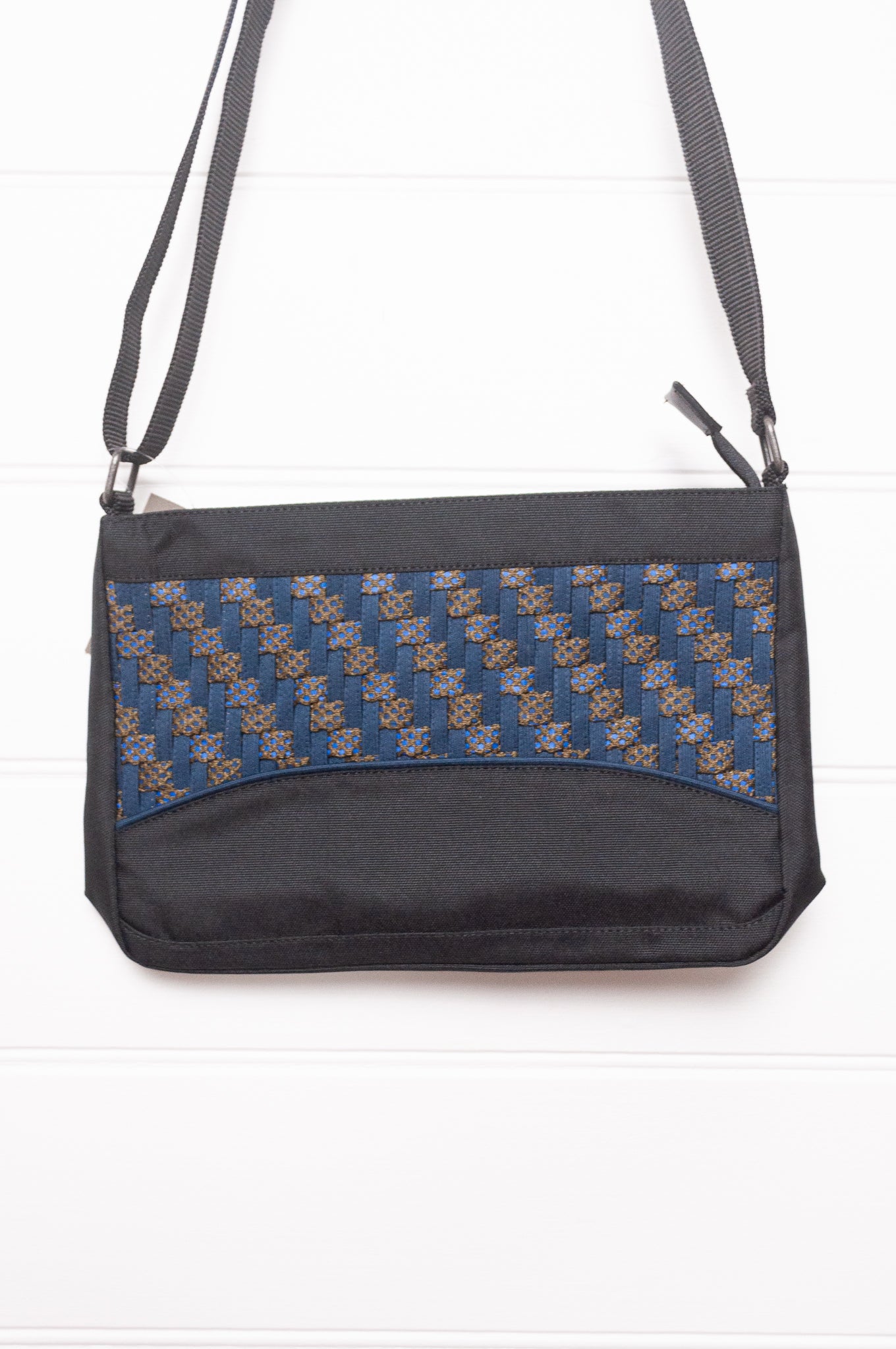 Anna Kaszer Taki small cross body bag in deep navy Night blue, with woven braid panel.
