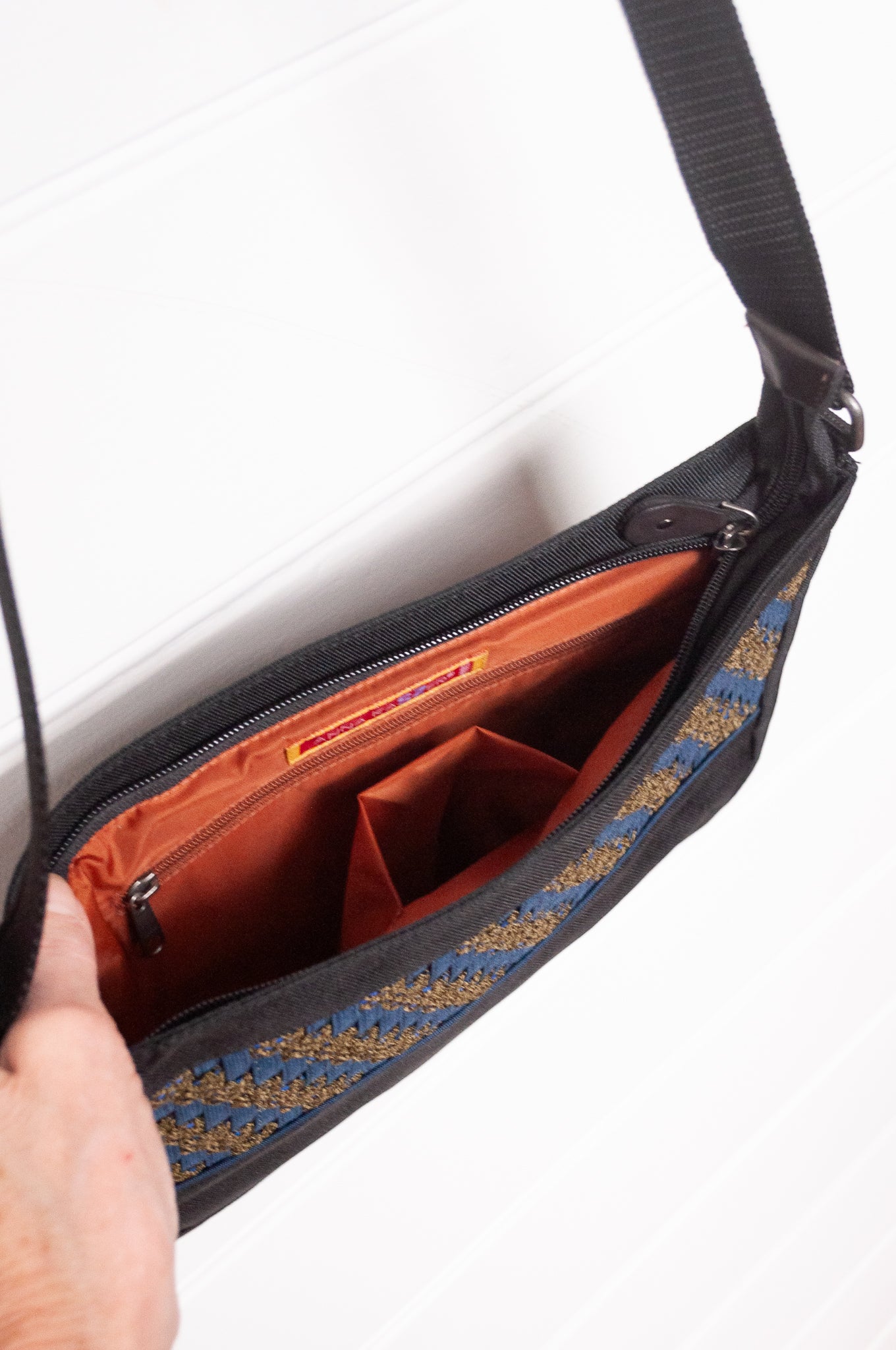 Anna Kaszer Taki small cross body bag in deep navy Night blue, with woven braid panel.