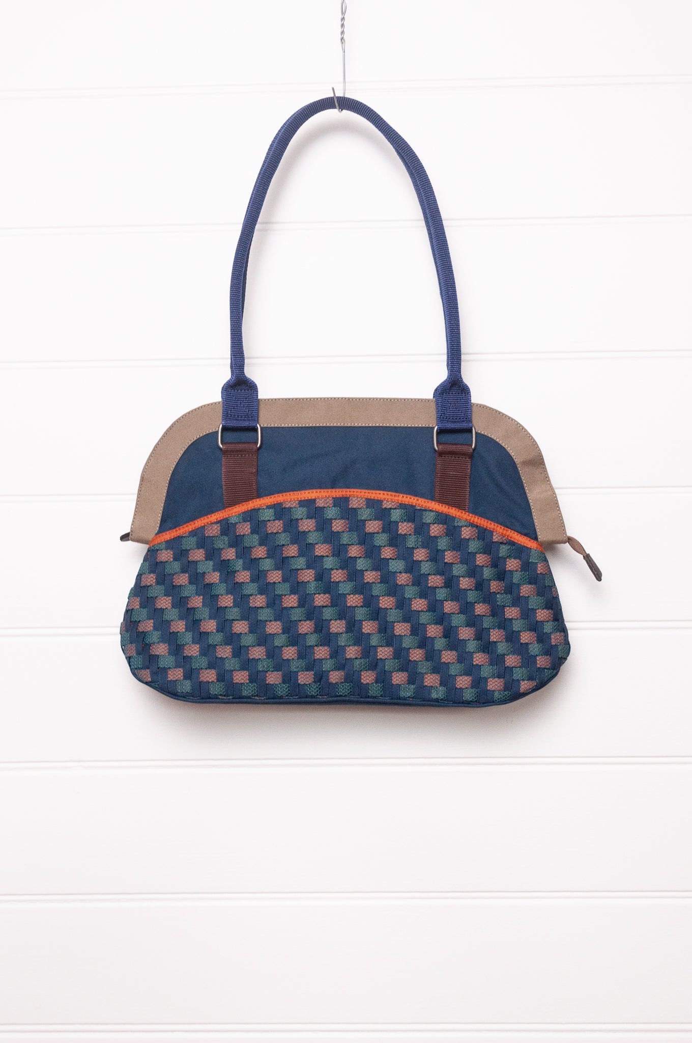 Anna Kaszer Fox bag in navy, taupe and burgundy, with double shoulder straps and woven braid panel.