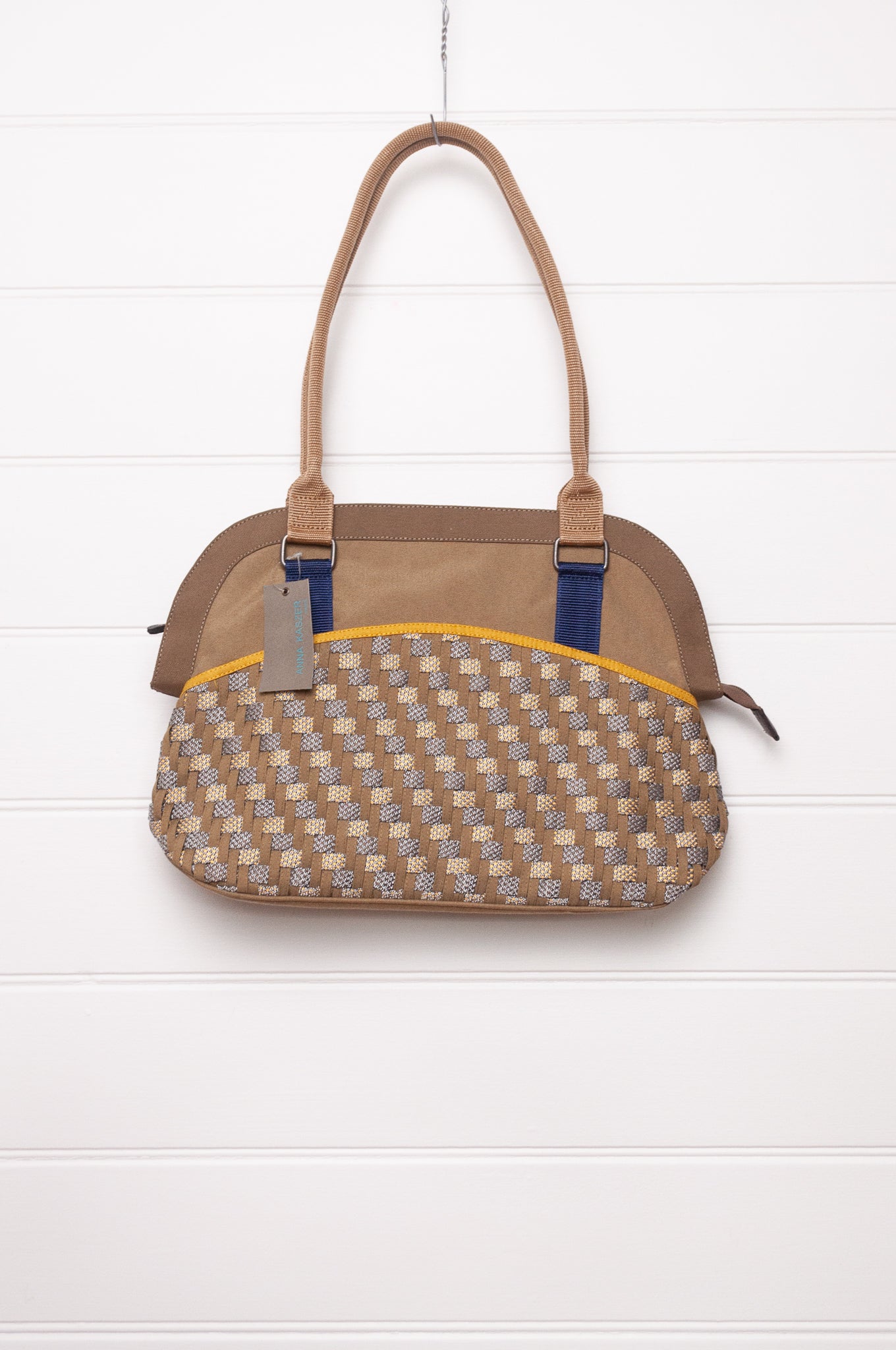 Anna Kaszer Fox bag in taupe, with double shoulder straps and woven braid panel.