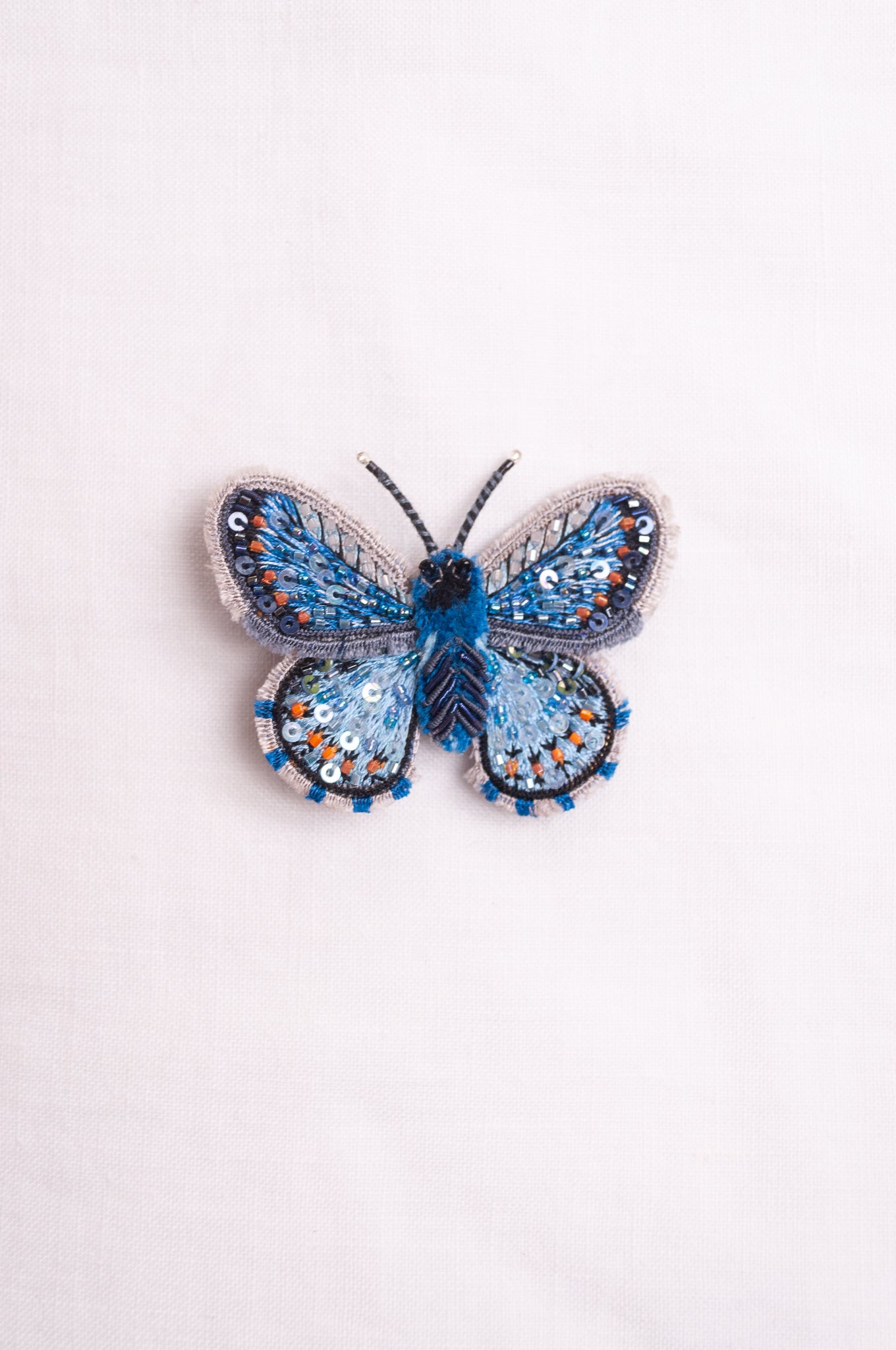 Trovelore hand embroidered and beeded Adonis bluel butterfly brooch.