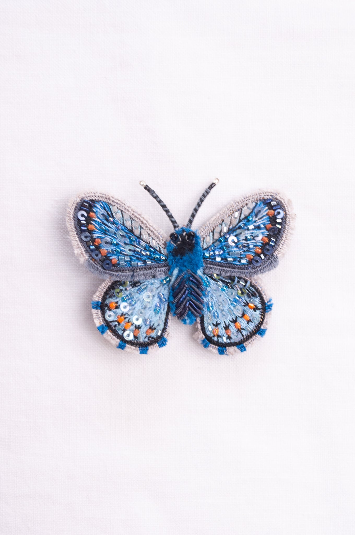 Trovelore hand embroidered and beeded Adonis bluel butterfly brooch.