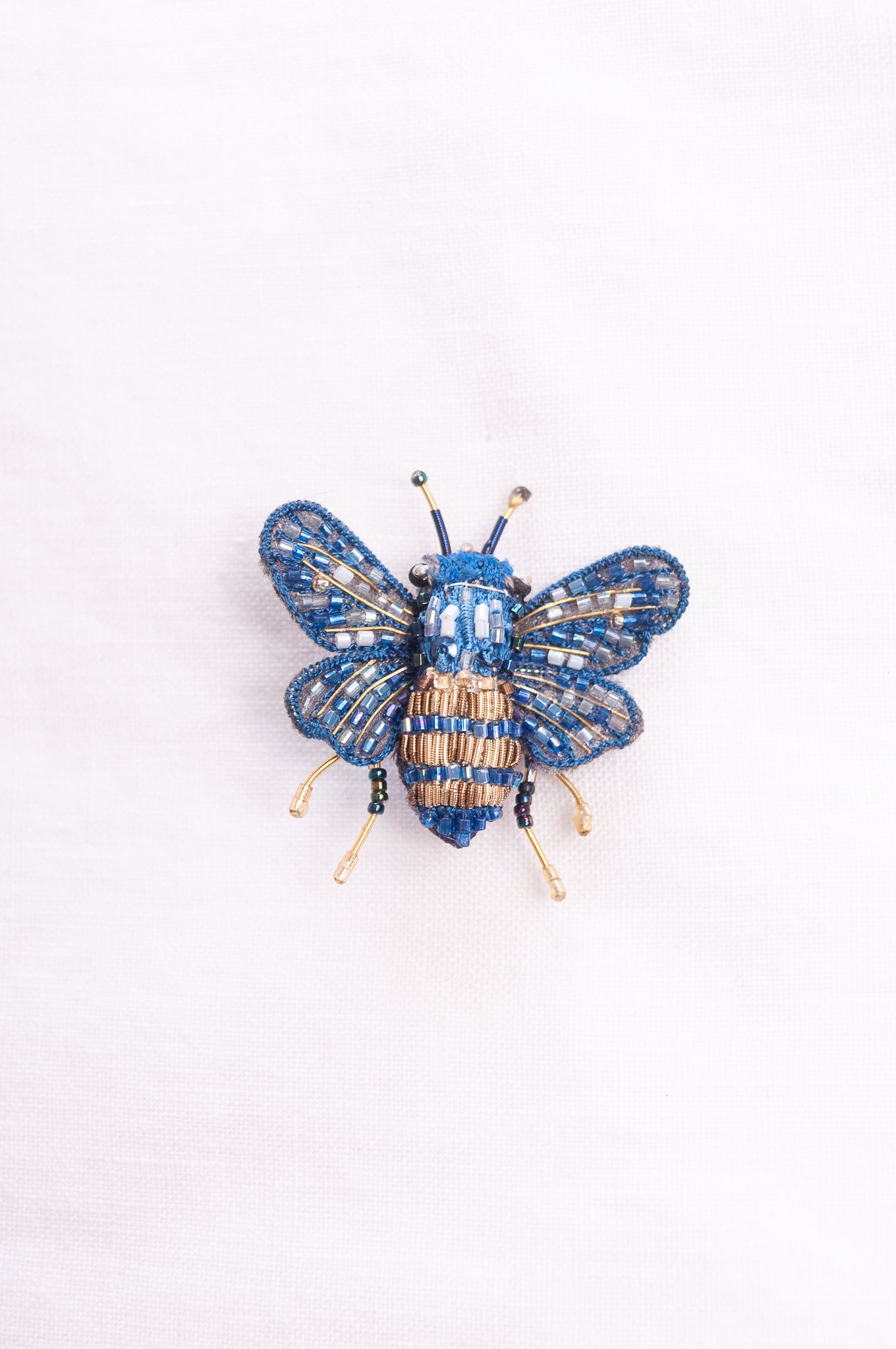 Trovelore hand embroidered and beeded Mason bee brooch.