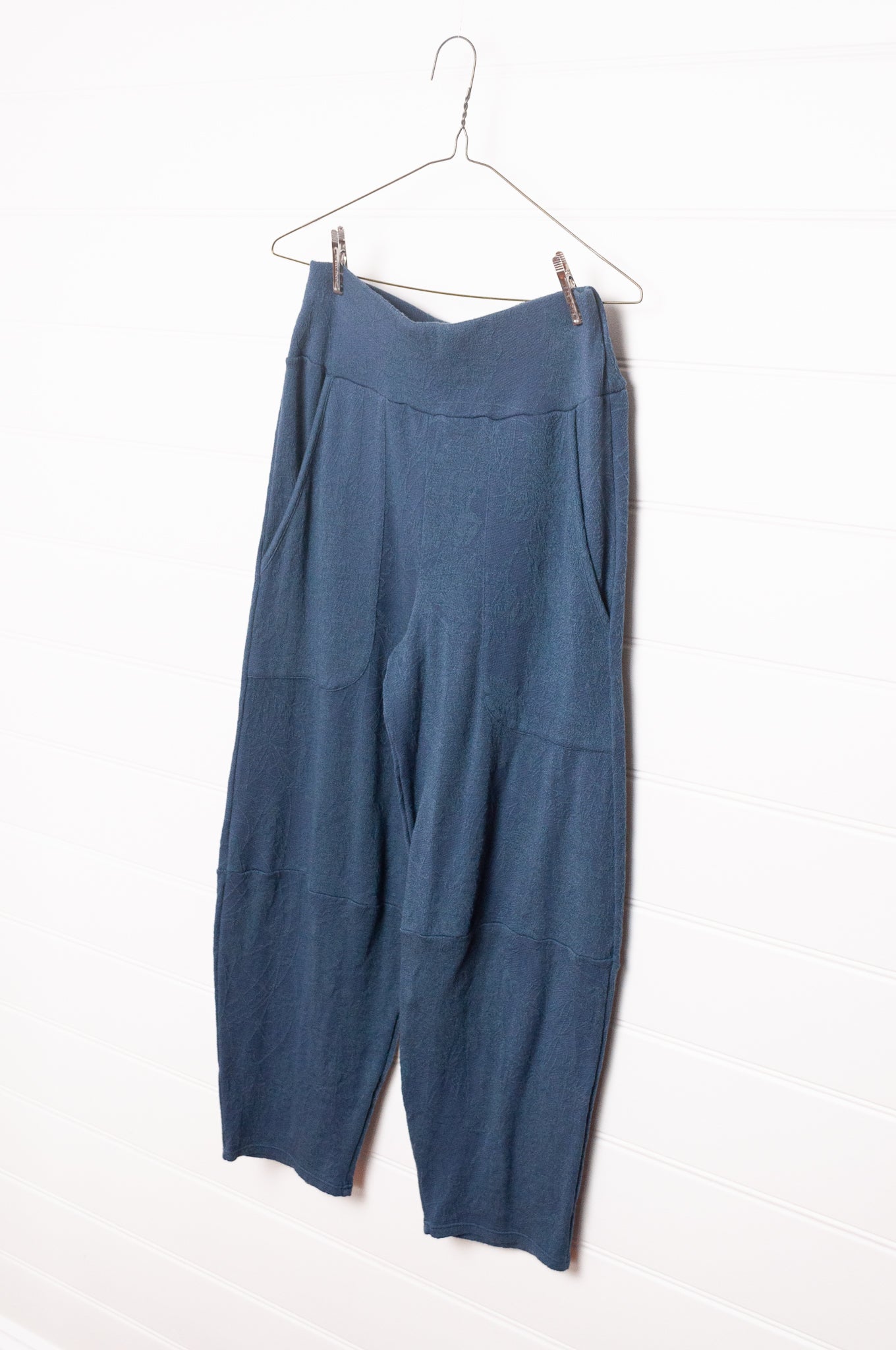 Valia merino wool jacquard knit travel pants in denim blue.