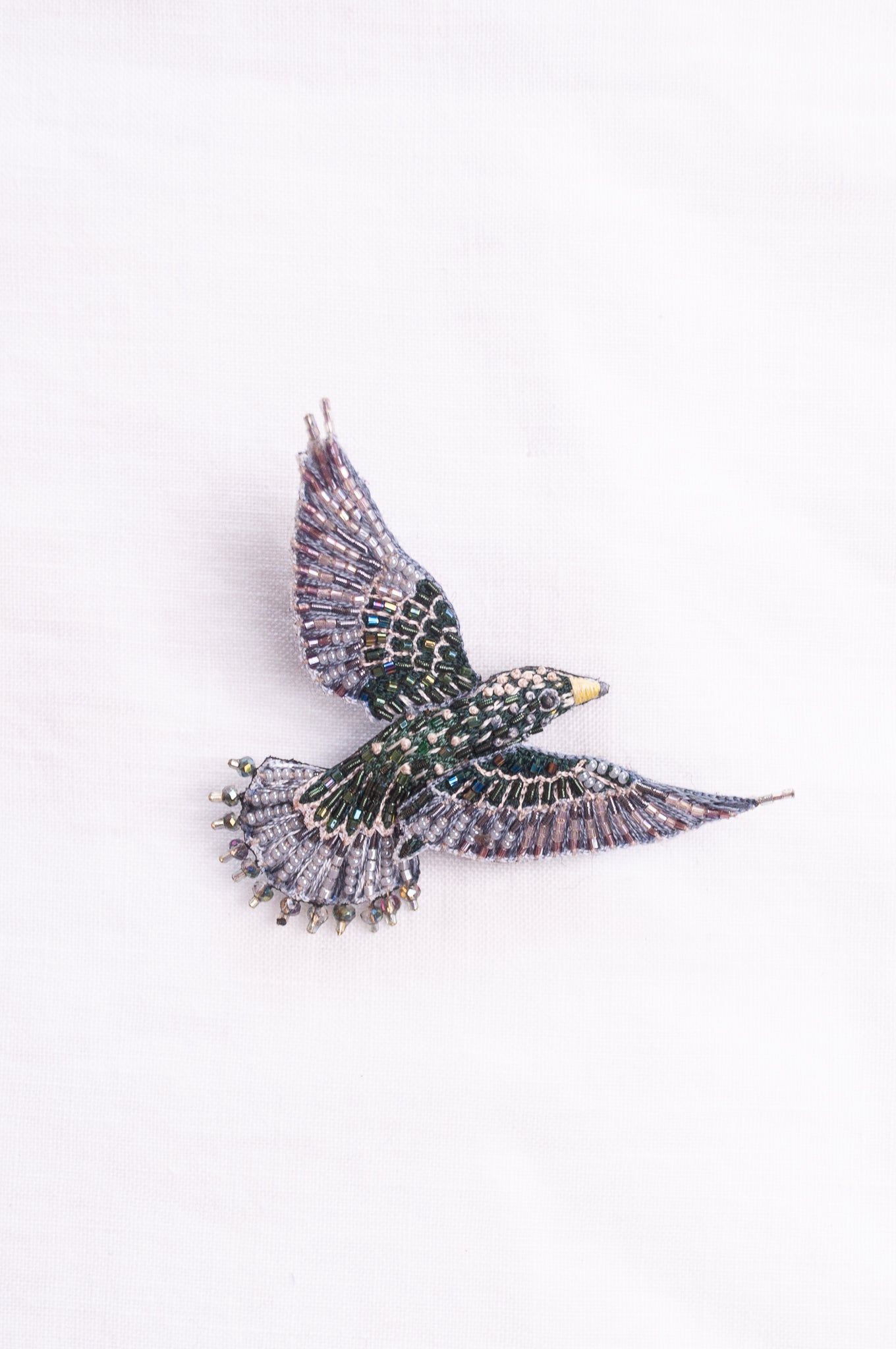 Trovelore hand embroidered and beeded Starling brooch.