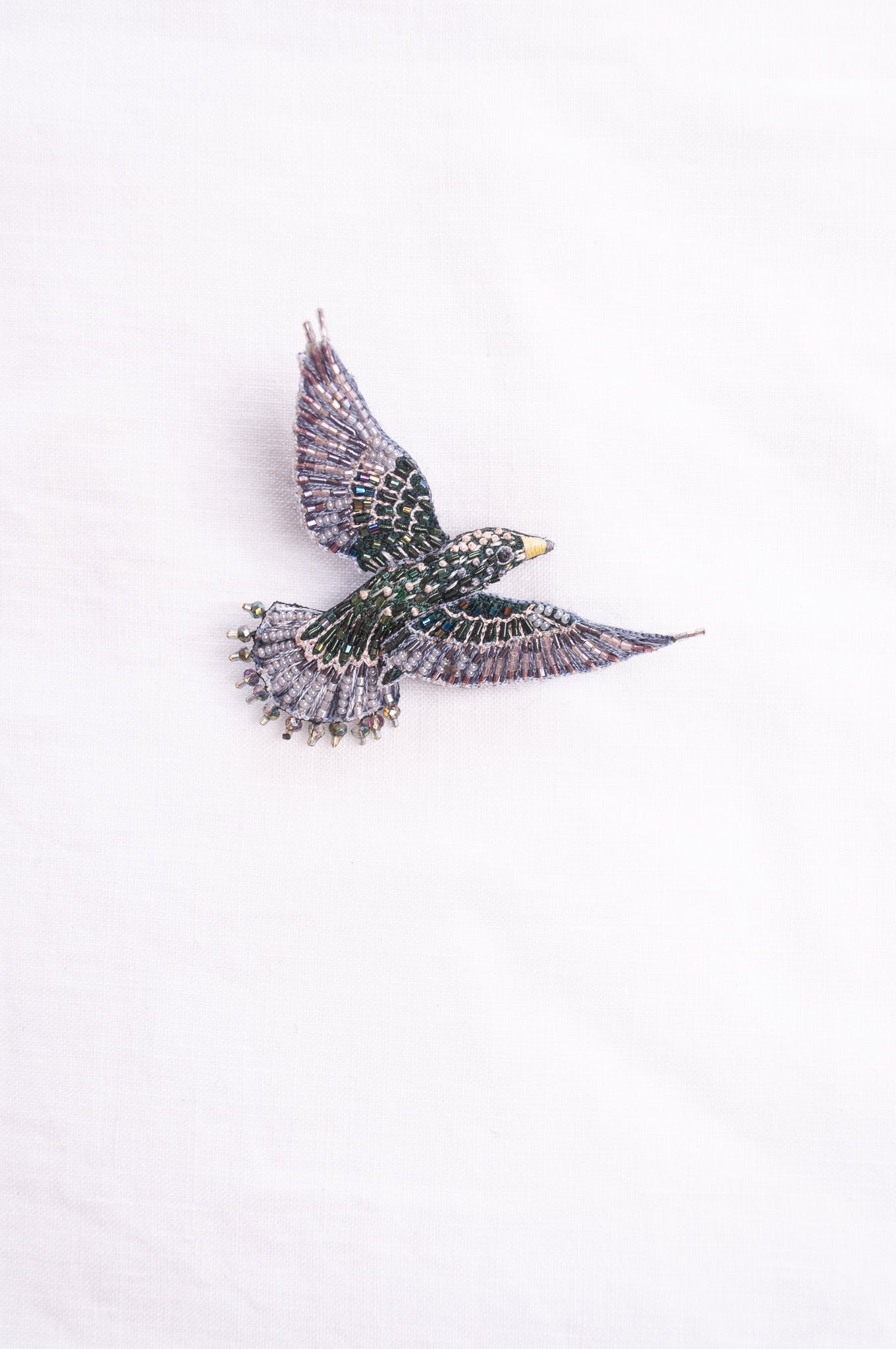 Trovelore hand embroidered and beeded Starling brooch.