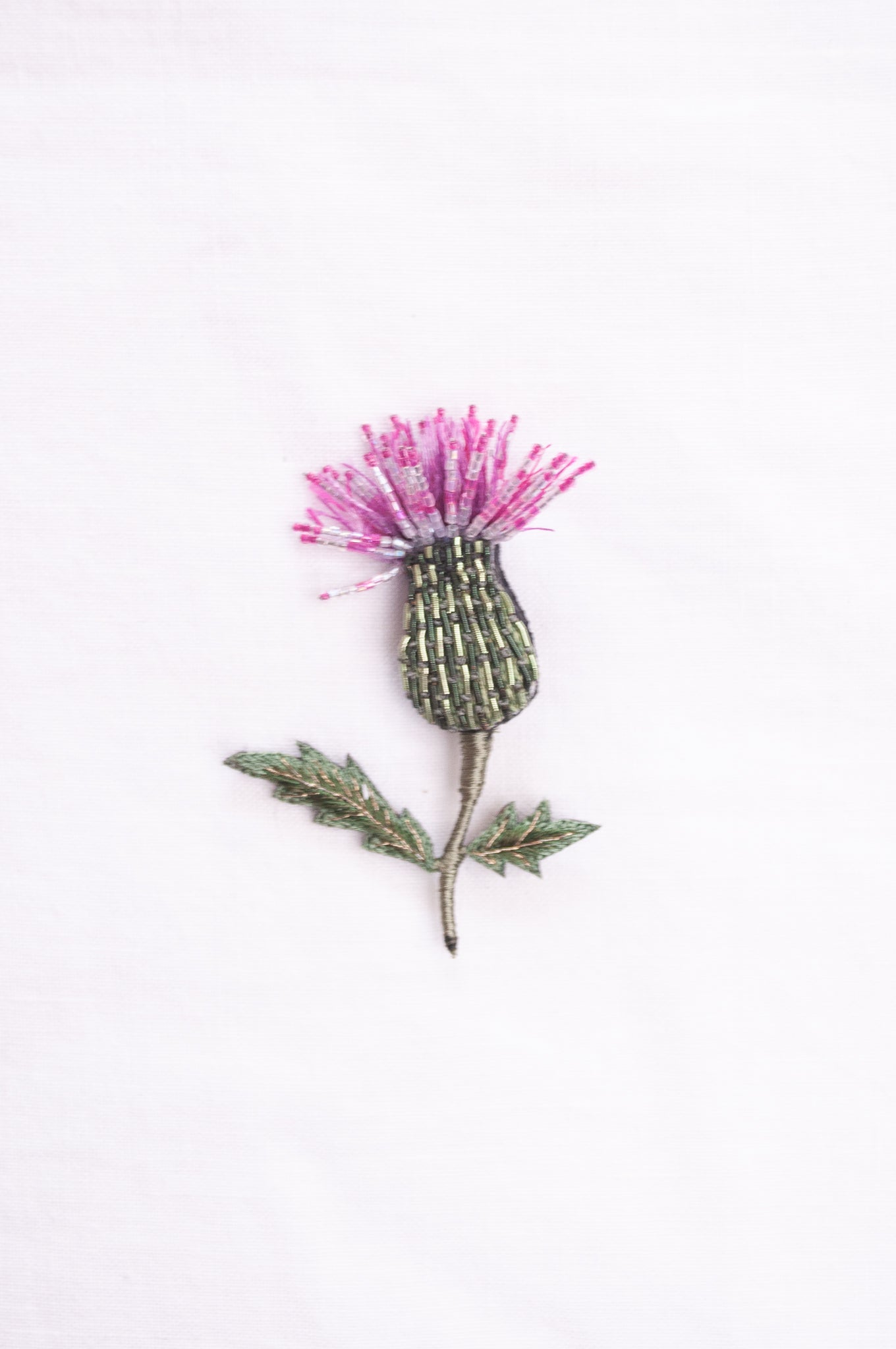 Trovelore hand embroidered and beaded Spear thistle brooch.