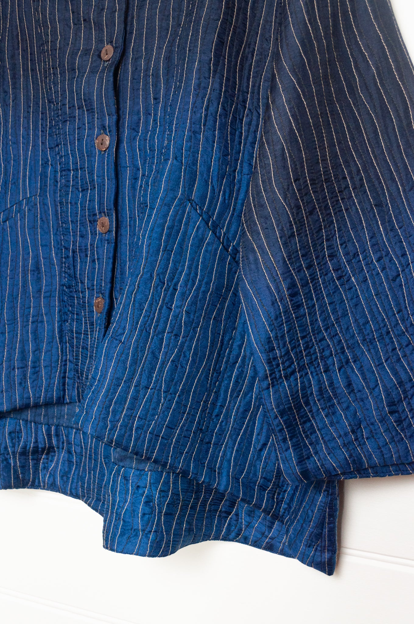 Raga silk quilted jacket ombre dyed in indigo blue.