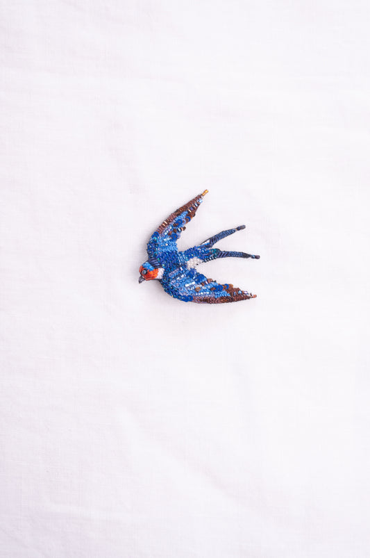 Trovelore hand embroidered and beeded Flying swallow brooch.