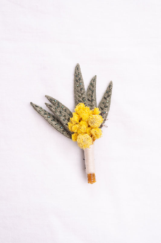 Trovelore hand embroidered and beaded Mimosa boutonniere brooch.
