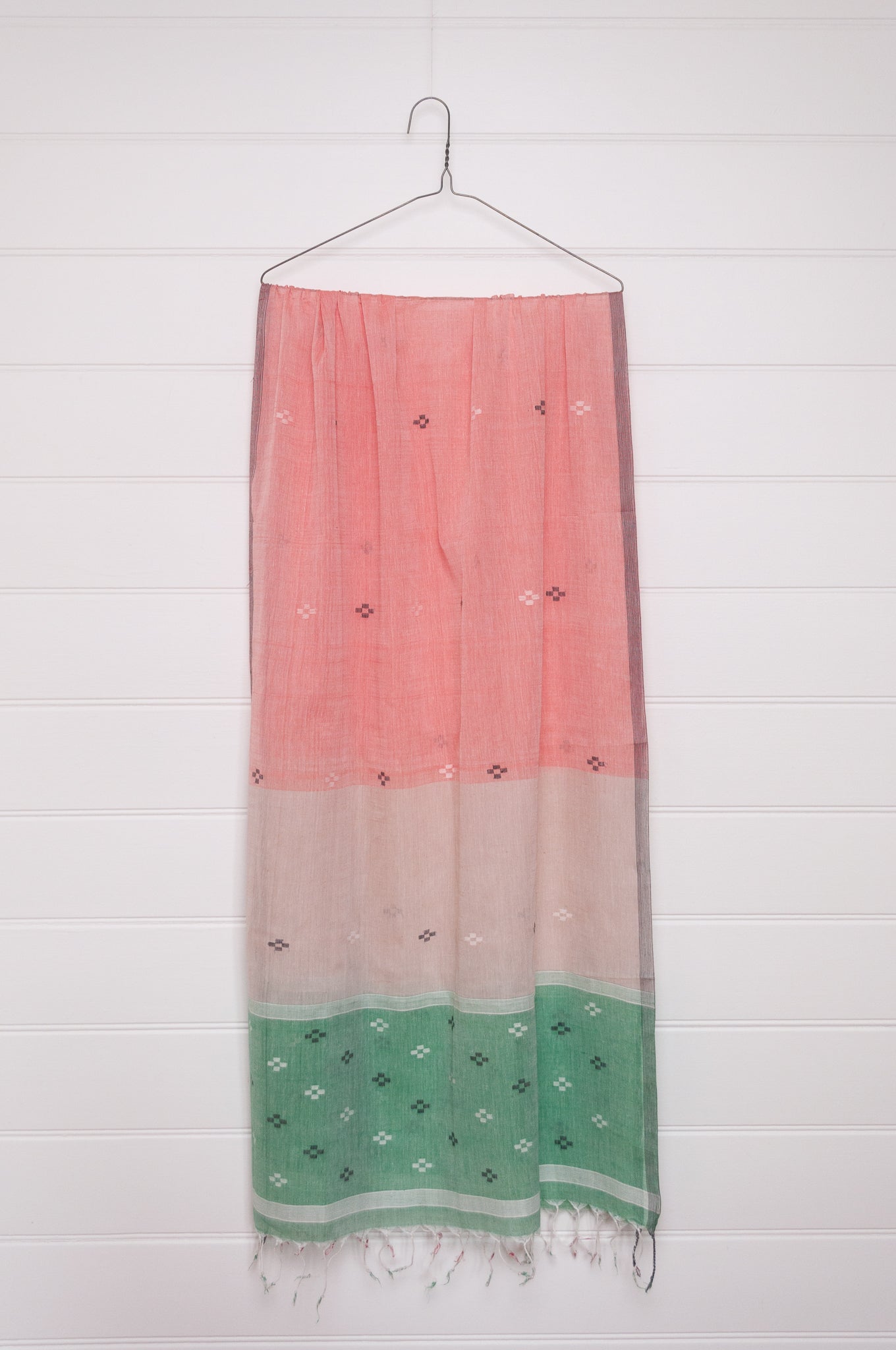 Handwoven light cotton jamdani scarf in light emerald green, coral and white.