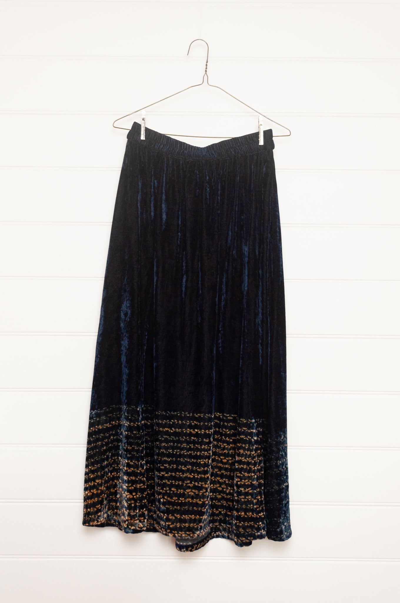 Raga elastic waist A-line skirt indigo silk velvet and shibori design at the hem.