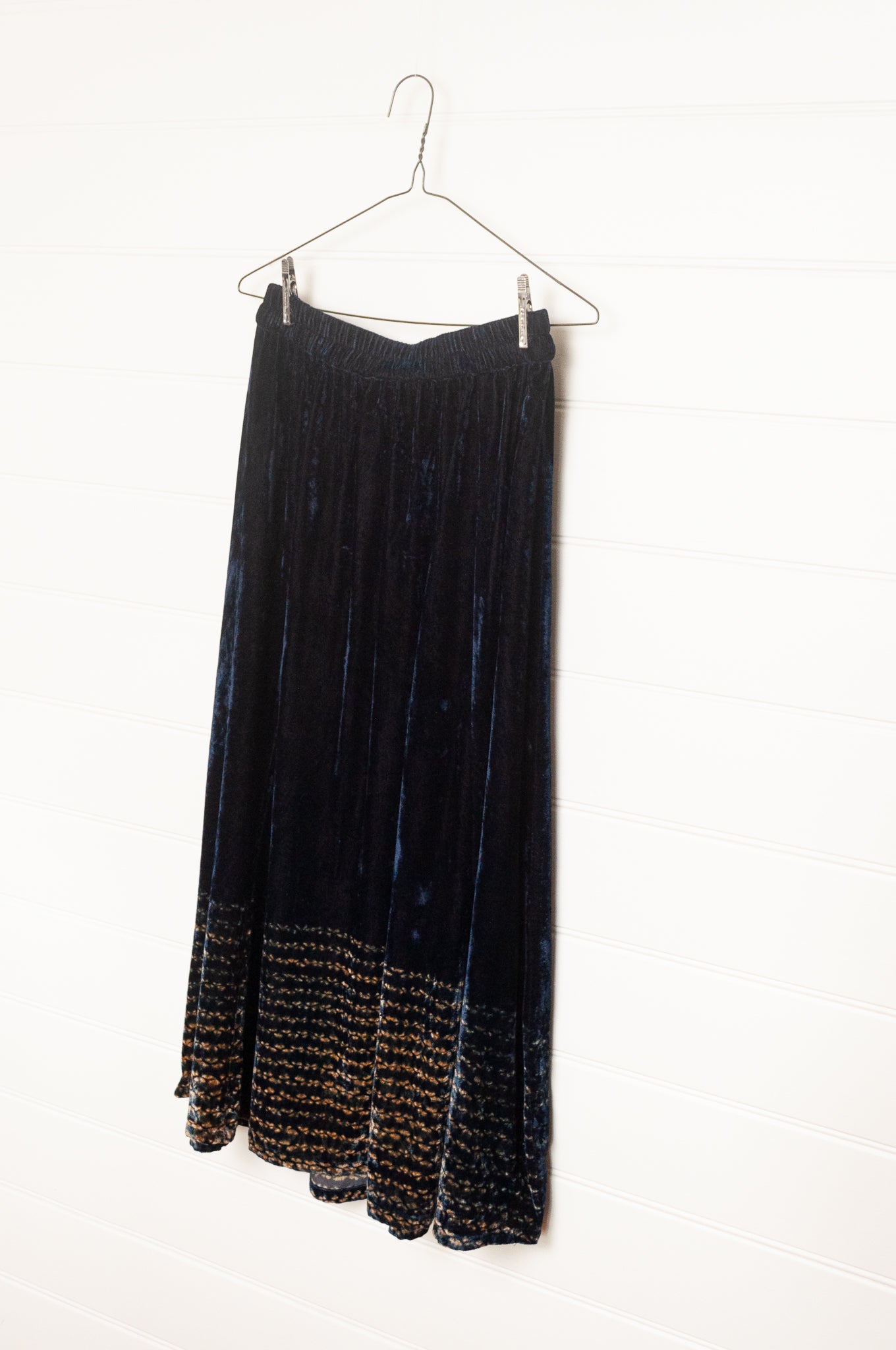 Raga elastic waist A-line skirt indigo silk velvet and shibori design at the hem.