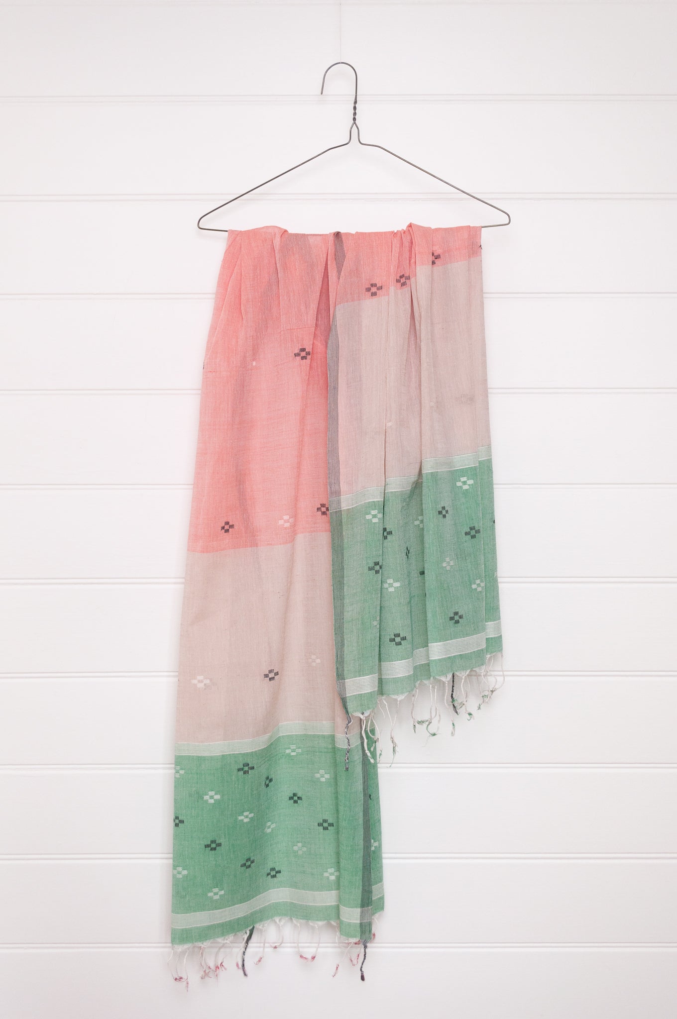 Handwoven light cotton jamdani scarf in light emerald green, coral and white.