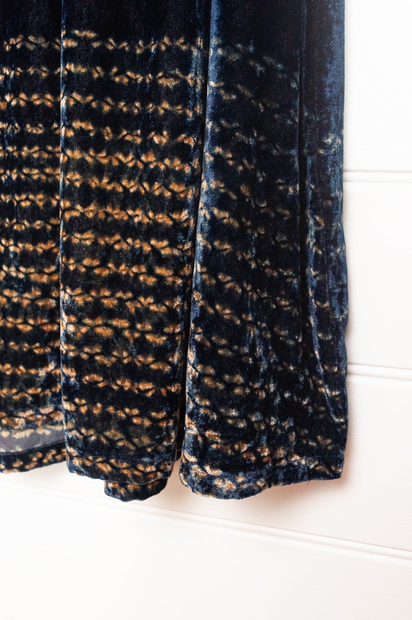 Raga elastic waist A-line skirt indigo silk velvet and shibori design at the hem.