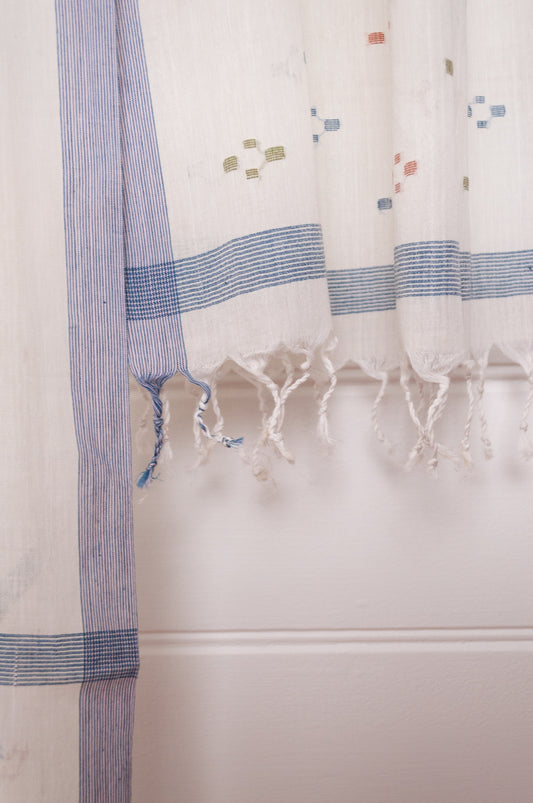 Handwoven light cotton jamdani scarf in ecru with multi-coloured motifs.