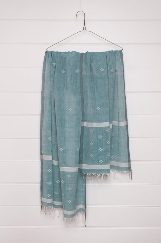 Handwoven light cotton jamdani scarf in light emerald green and white.