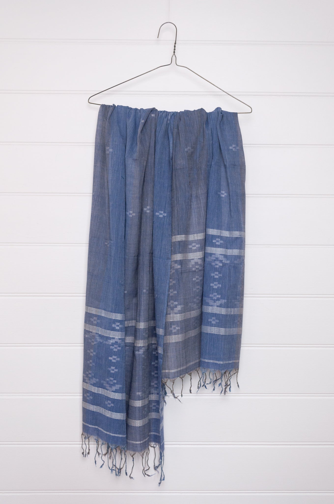Handwoven light cotton  indigo panelled jamdani scarf with stripes and motifs in white.