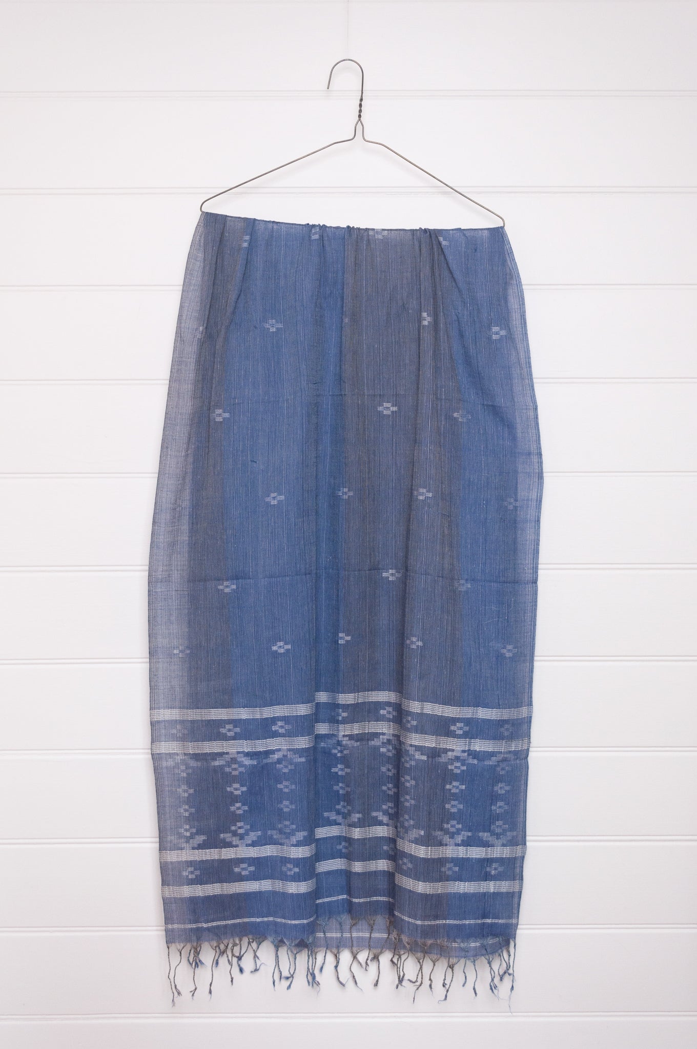 Handwoven light cotton  indigo panelled jamdani scarf with stripes and motifs in white.