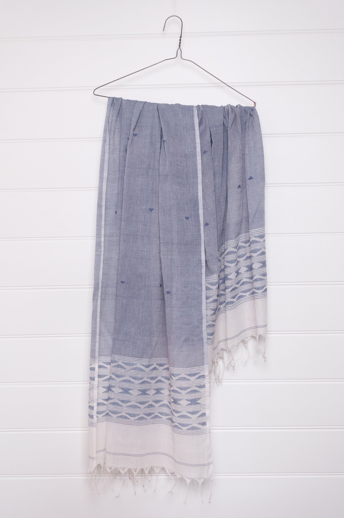 Handwoven light cotton light indigo panelled jamdani scarf with stripes and border motifs.