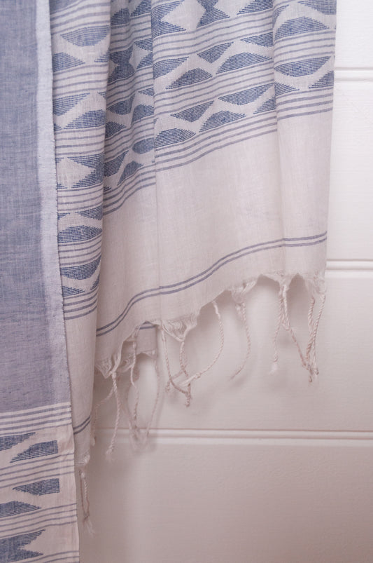 Handwoven light cotton light indigo panelled jamdani scarf with stripes and border motifs.