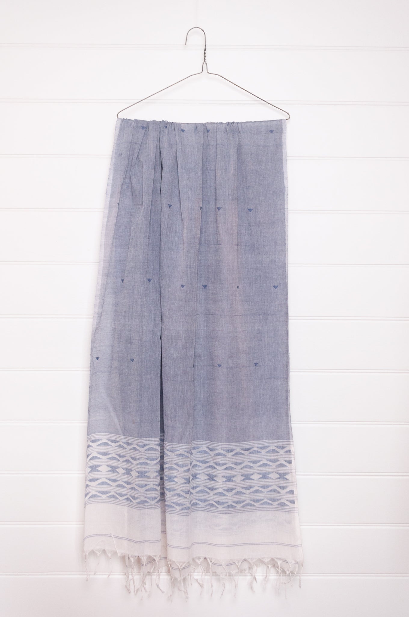 Handwoven light cotton light indigo panelled jamdani scarf with stripes and border motifs.