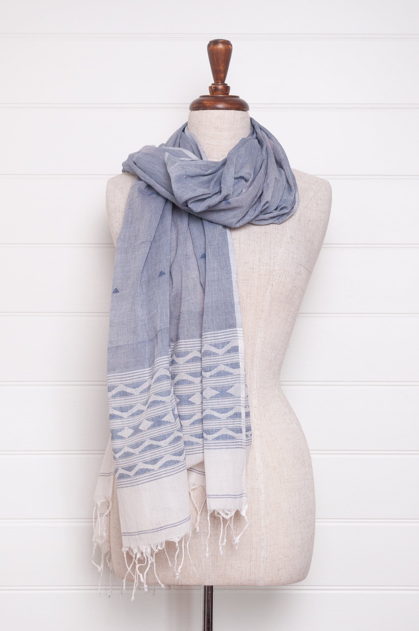 Handwoven light cotton light indigo panelled jamdani scarf with stripes and border motifs.