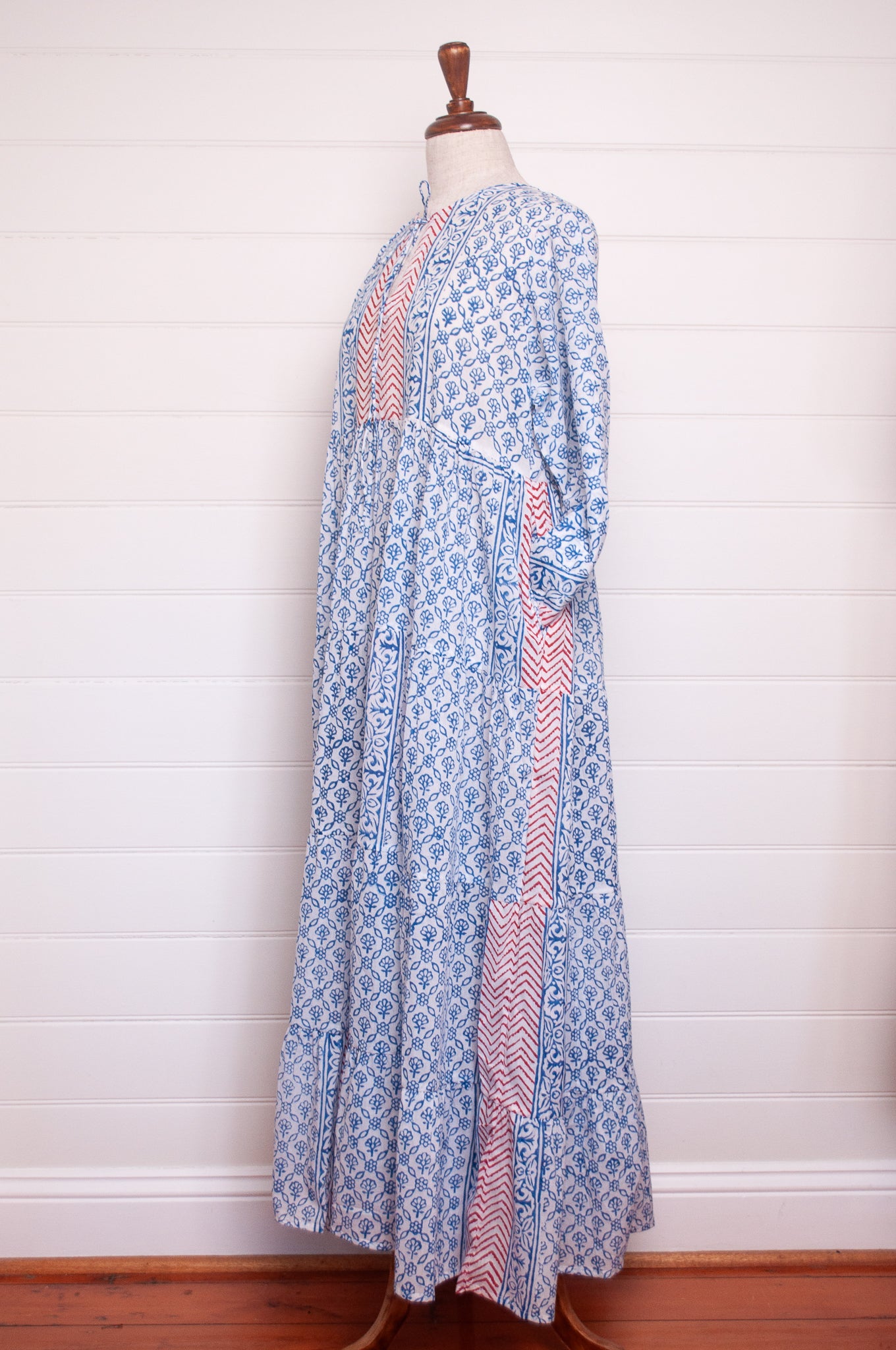 Dora Maxi dress light cotton voile blockprint maxi dress sky blue on white floral with red accents.