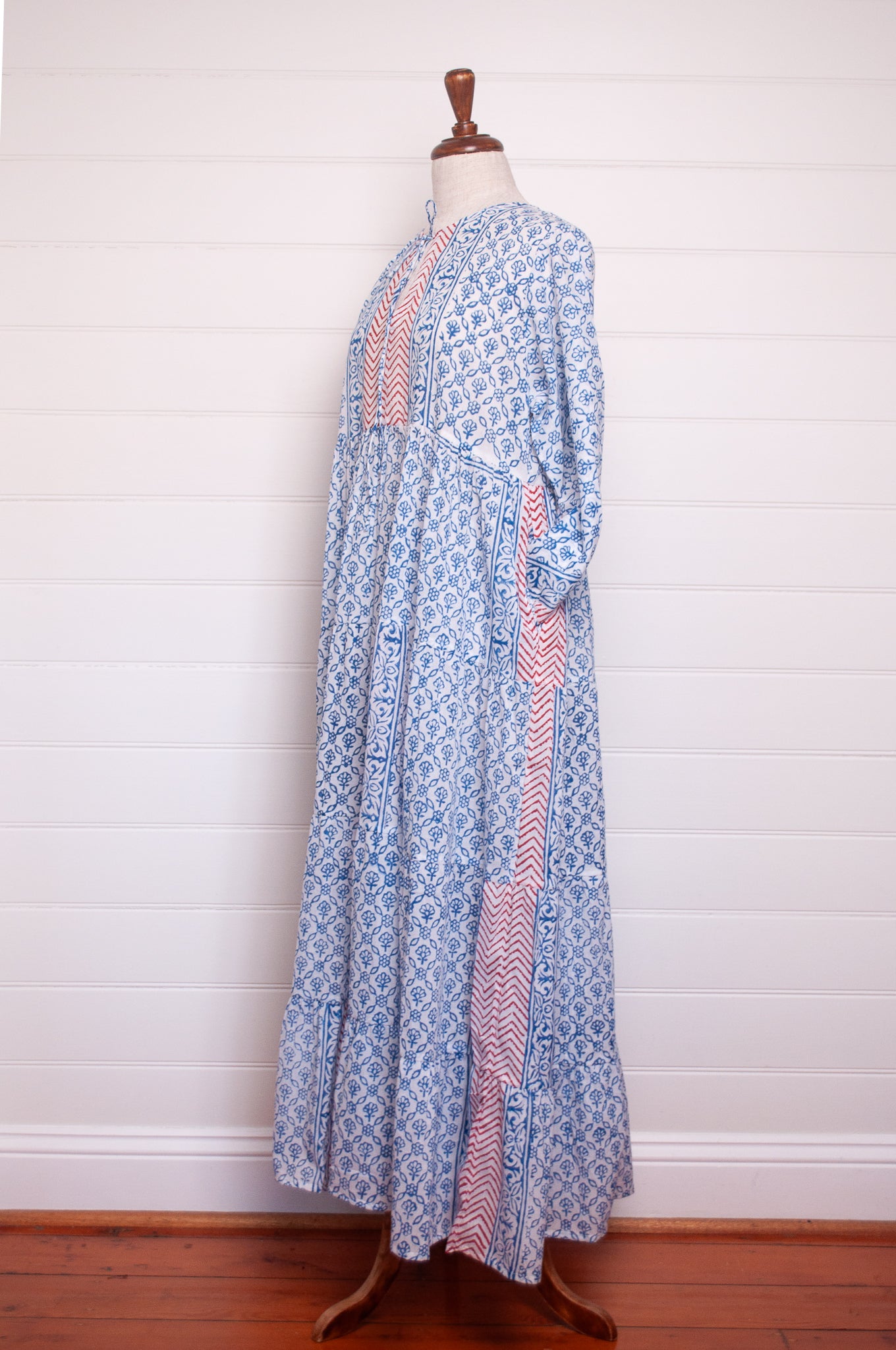 Dora Maxi dress light cotton voile blockprint maxi dress sky blue on white floral with red accents.