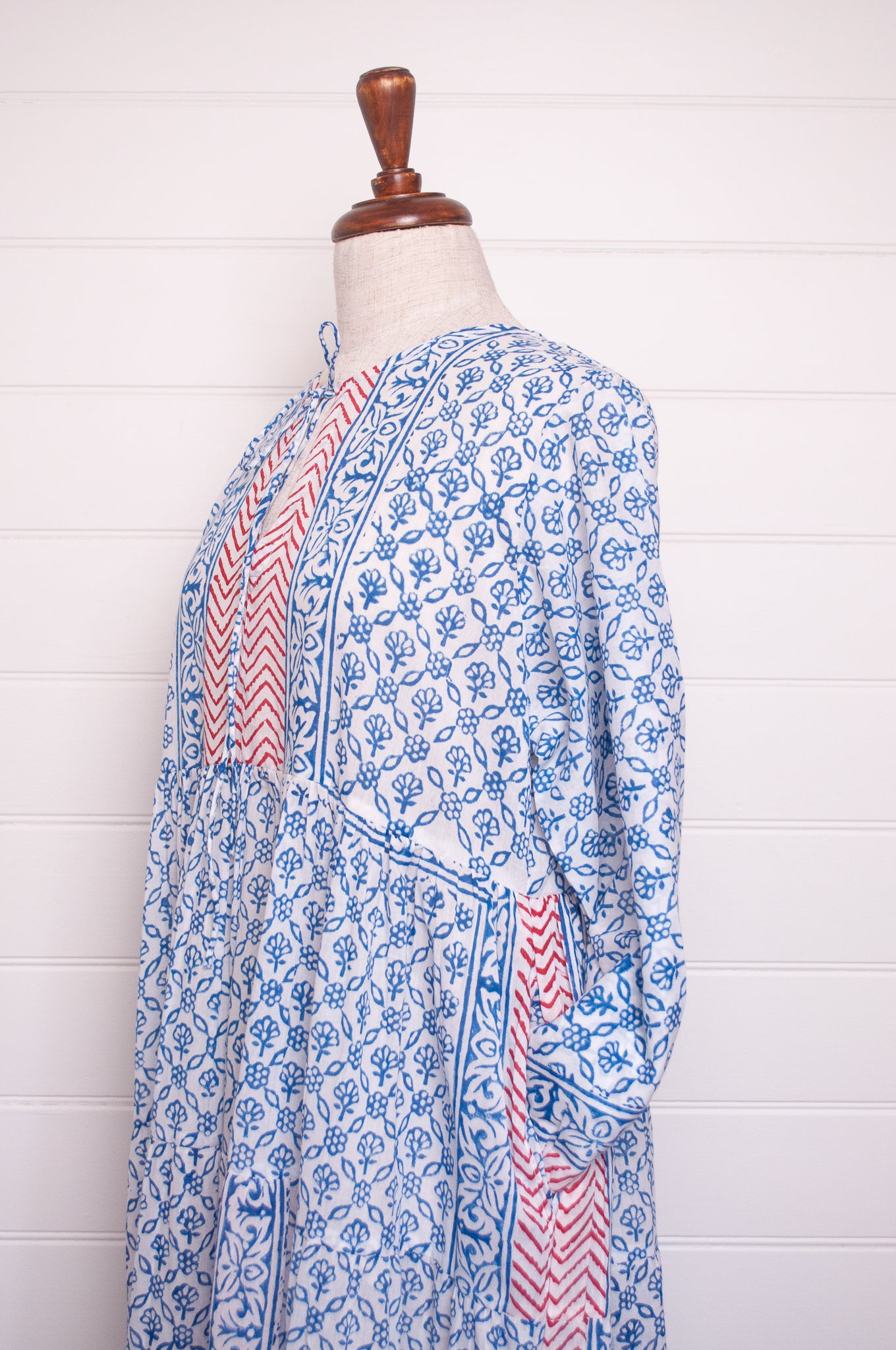 Dora Maxi dress light cotton voile blockprint maxi dress sky blue on white floral with red accents.