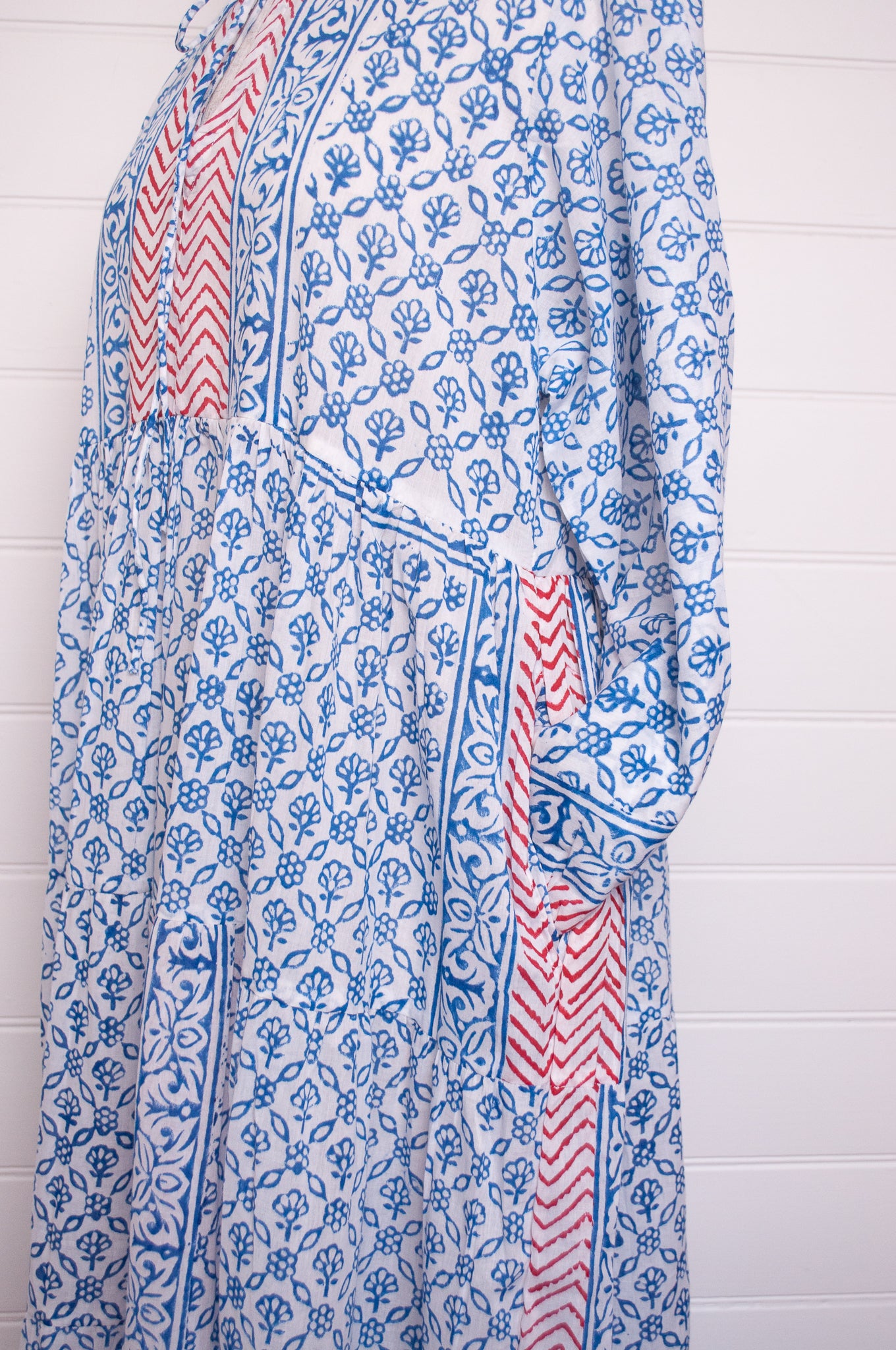 Dora Maxi dress light cotton voile blockprint maxi dress sky blue on white floral with red accents.