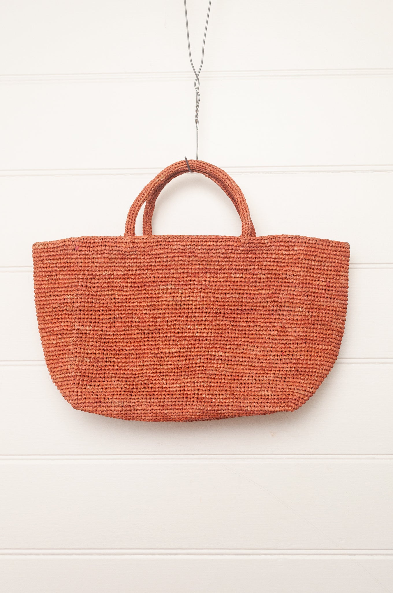 Sophie Digard medium sized crocheted raffia bag in Bois de Rose warm pink.
