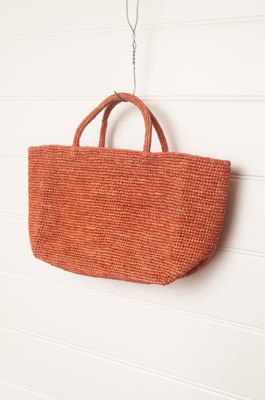 Sophie Digard medium sized crocheted raffia bag in Bois de Rose warm pink.