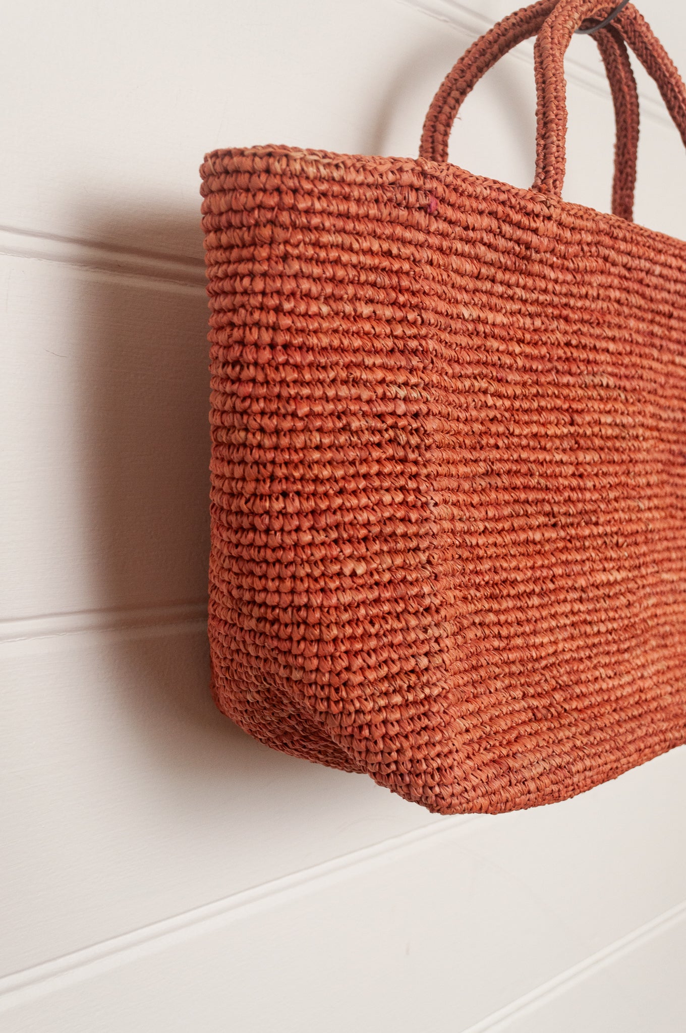 Sophie Digard medium sized crocheted raffia bag in Bois de Rose warm pink.