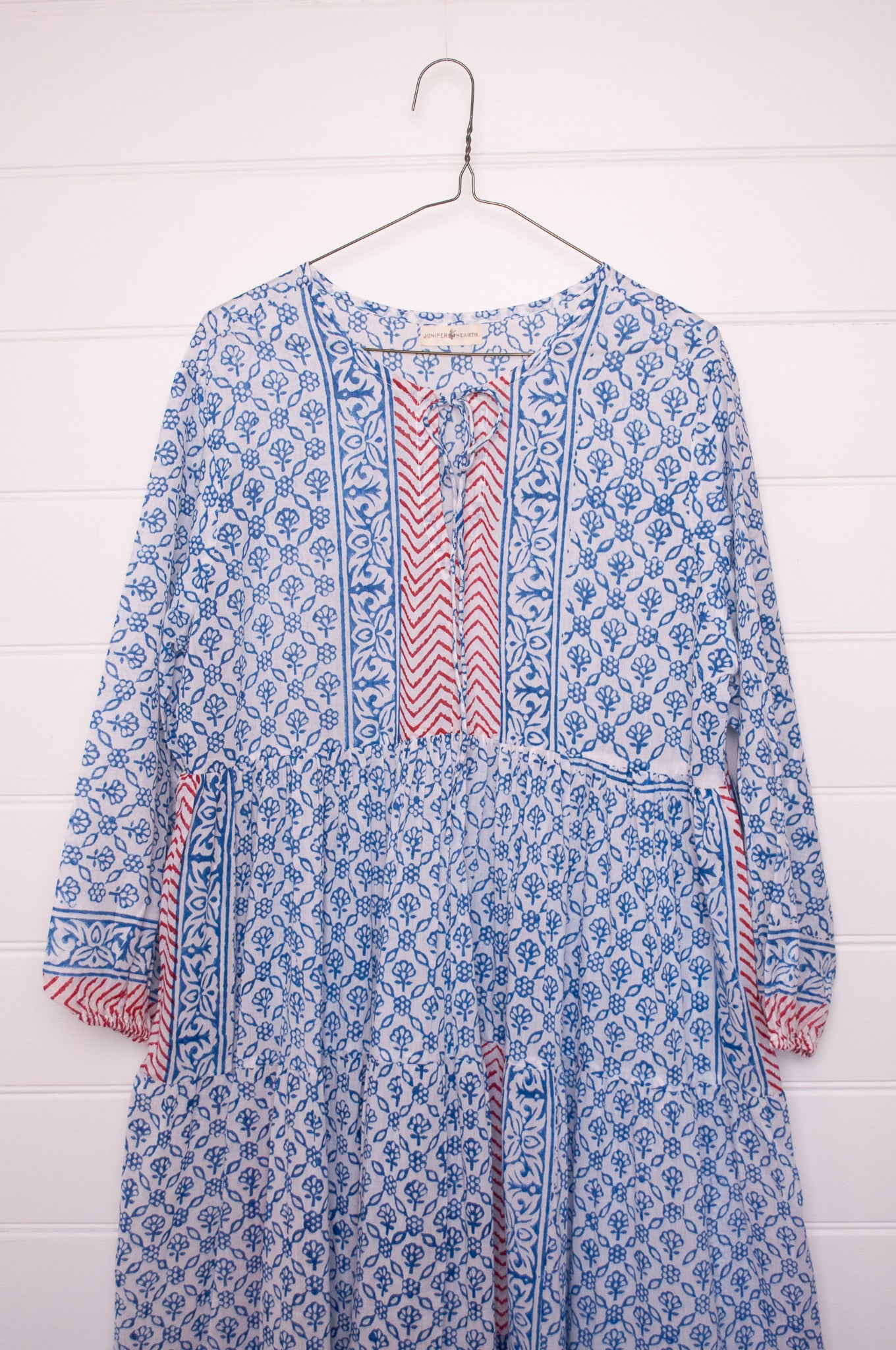 Dora Maxi dress light cotton voile blockprint maxi dress sky blue on white floral with red accents.