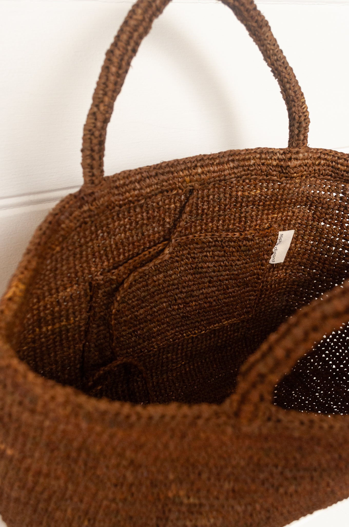 Sophie Digard medium sized crocheted raffia bag in tobacco brown.