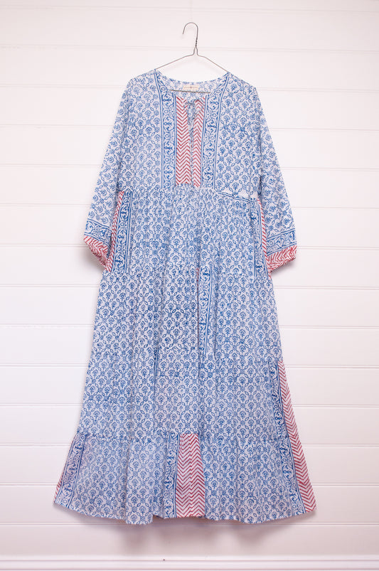 Dora Maxi dress light cotton voile blockprint maxi dress sky blue on white floral with red accents.