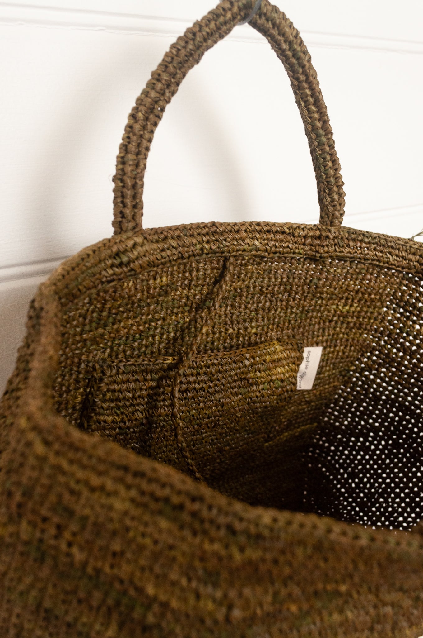 Sophie Digard medium sized crocheted raffia bag in Ossido deep olive green.