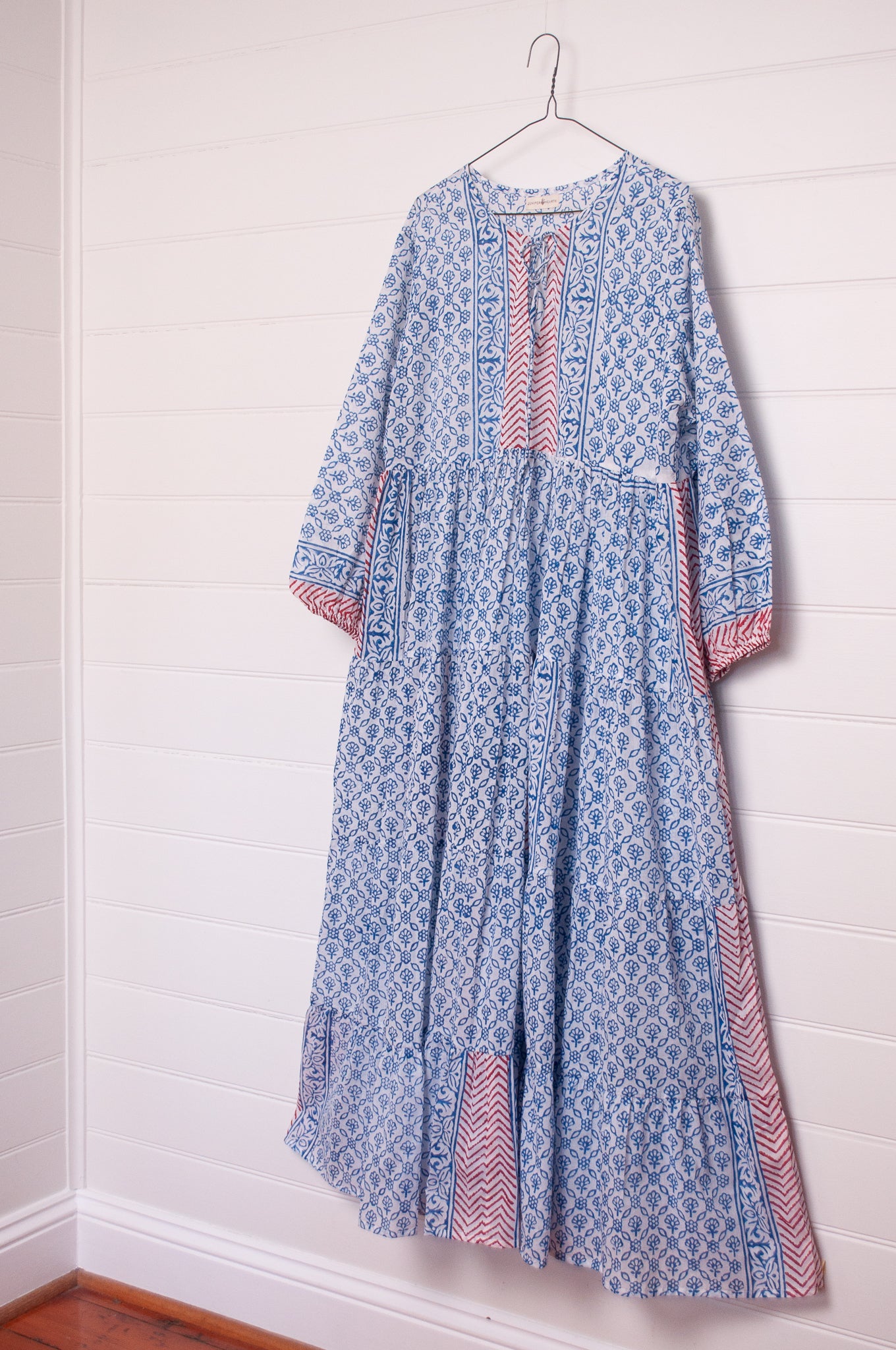 Dora Maxi dress light cotton voile blockprint maxi dress sky blue on white floral with red accents.