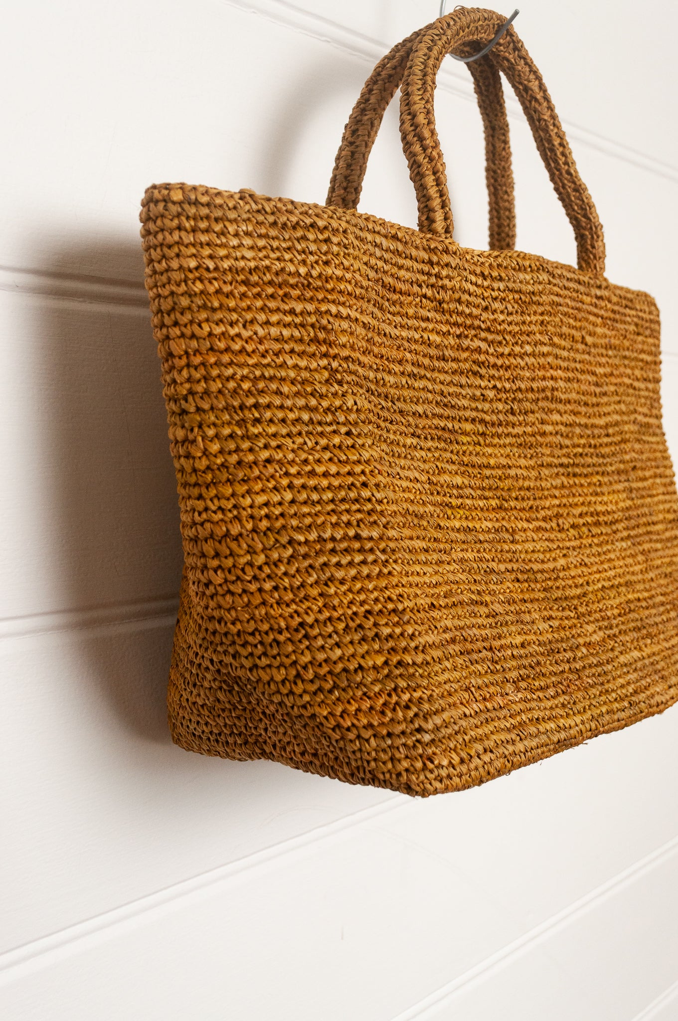 Sophie Digard medium sized crocheted raffia bag in Oro golden brown.