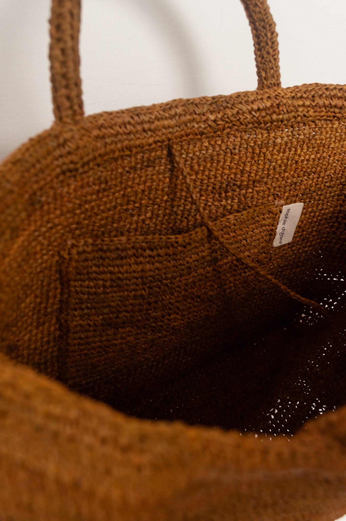 Sophie Digard medium sized crocheted raffia bag in Oro golden brown.